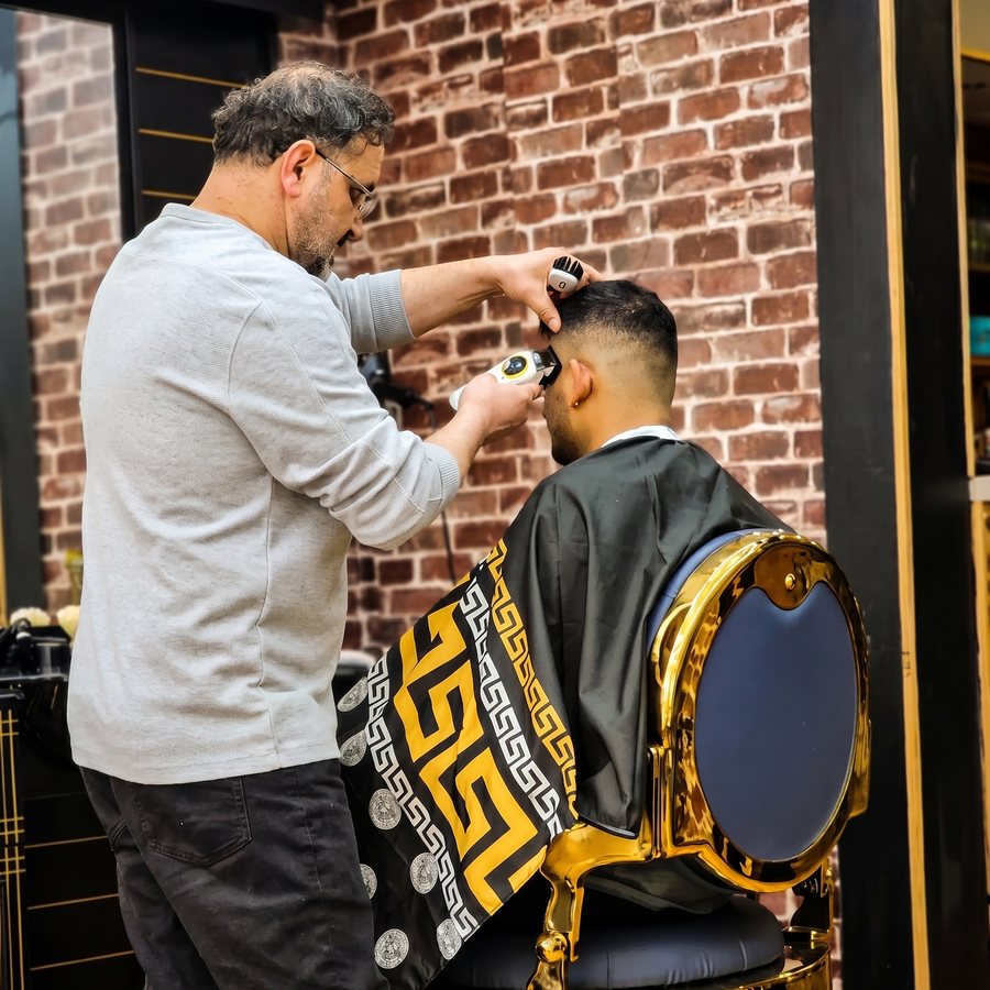 Barber working on a fade